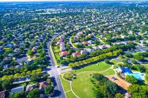Round Rock , Texas , USA aerial drone view high above Suburb Neighborhood at park Homes