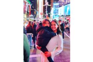 Michelle Renaud y su hijo (1).jpg