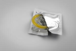 Condom isolated. Contraceptive protection from pregnancy, AIDS.