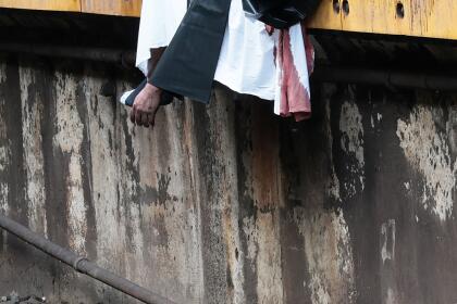 NEW YORK, NEW YORK - JULY 30: (EDITOR'S NOTE: Image depicts death.) (EDITOR'S NOTE, Image contains graphic content.) The body of a man hit by a train is seen on the platform at the Prospect Park subway stop on July 30, 2025 in the Prospect Lefferts Gardens neighborhood of the Brooklyn borough in New York City. (Photo by Michael M. Santiago/Getty Images)