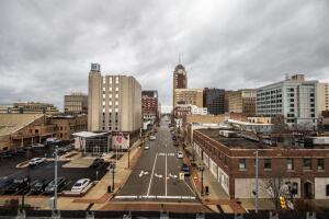 Streets Of Downtown Lansing Michigan With Skyline