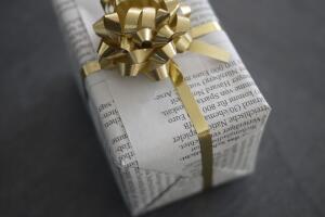 present  wrapped newspaper instead