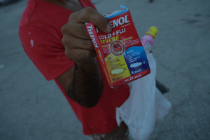 Worker-with-medicine-copy.png