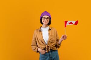 Mujer con bandera de Canadá Grosby.jpg