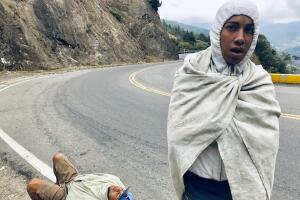 Exhausted and cold venezuelan refugees hike colombian andes.jpg
