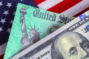 Hundred Dollar Bill With Tax Refund and Flag