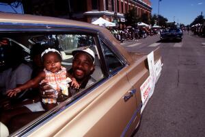 DENVER, CO--JUNETEENTH--Local boxing favorite Stevie Johnston with daughter Vivica , 4-months, as they participate in the Juneteenth parade in 5 points. The festivities conclude on Sunday.THE DENVER POST/JOHN LEYBA 1998