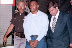 Convicted rapist Mike Tyson (C) leaves t