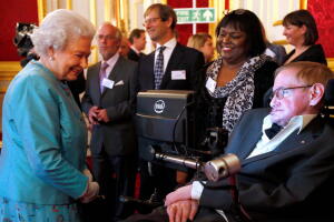 FILE PHOTO: Britain's Queen Elizabeth meets Hawking during reception for Leonard Cheshire Disability charity at St James's Palace in London