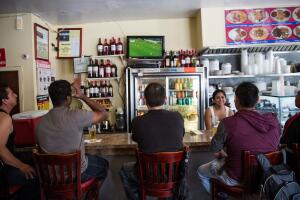 Fans Of The Mexican Team Soccer Watch Country's World Cup Game Against Cameroon