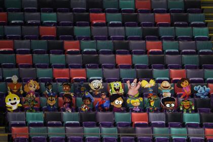 NEW ORLEANS, LOUISIANA - JANUARY 10: A detailed view of Nickelodeon cartoon characters cardboard cutouts are seen in the stands during the fourth quarter in the NFC Wild Card Playoff game between the Chicago Bears and the New Orleans Saints at Mercedes Benz Superdome on January 10, 2021 in New Orleans, Louisiana. (Photo by Chris Graythen/Getty Images)