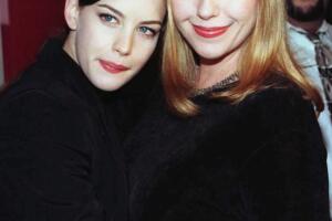 Model-actress Liv Tyler (L) poses with her mother