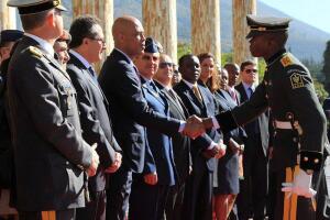 Herard shaking Martelly's hand