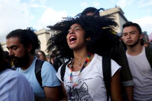 Demonstrators take part in a protest as a national strike continues in Bogota