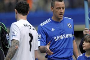 Chelsea's captain John Terry (R) fails t
