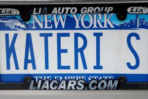 The license plate of a car referring to
