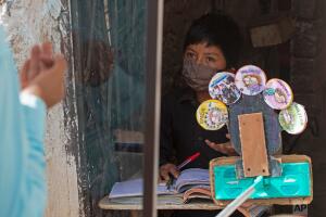 APTOPIX Virus Outbreak One Good Thing - Guatemala Teacher