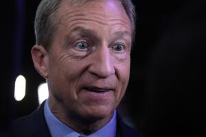 Democratic presidential candidate and billionaire activist Tom Steyer is interviewed in the spin room after the U.S. Democratic presidential candidates debate at the Tyler Perry Studios in Atlanta