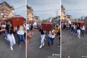 Despiden a su amiga bailando reggaetón con ataúd a cuestas.jpg