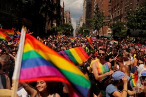 Marchers walk down 5th Avenue as they part in the 2019 World Pride NYC and Stonewall 50th LGBTQ Pride Parade in New York