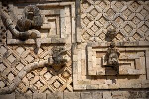 A sculpture of a serpent representing god Kukulkan in the Mayan ruins of Uxmal in the Yucatan peninsula, Mexico, Grosby (1).jpg