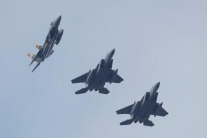 FILE PHOTO: U.S. Air Force F-15 fighter jets fly in formation during the Clear Sky 2018 multinational military drills in Khmelnytskyi Region