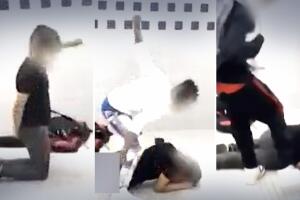 Estudiantes golpean a otro estudiante en el baño de la escuela.