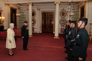Queen Elizabeth II Views Ornate Gurkha Truncheon