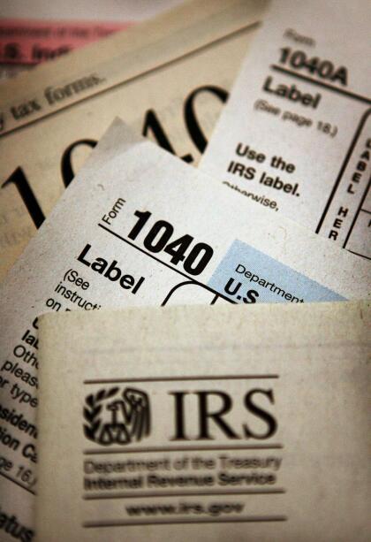 CHICAGO - NOVEMBER 1: Current federal tax forms are distributed at the offices of the Internal Revenue Service November 1, 2005 in Chicago, Illinois. A presidential panel today recommended a complete overhaul of virtually every tax law for individuals and businesses. (Photo Illustration by Scott Olson/Getty Images)