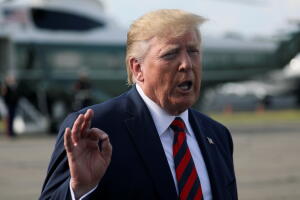 U.S. President Donald Trump speaks to reporters before boarding Air Force One to return to Washington from Morristown Municipal Airport in Morristown, New Jersey