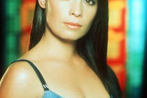 Holly Marie Combs como Piper Halliwell en 'Charmed'
