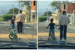 Niño ayuda a abuelito.jpg