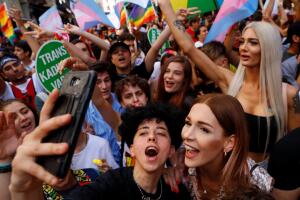 LGBT rights activists gather to try to march for a pride parade, which was banned by the governorship, in central Istanbul