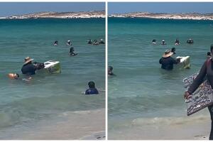 Mexicano es captado vendiendo helados dentro del mar.