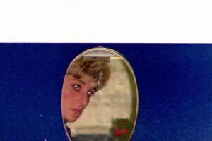 Britain's Princess Diana peers out the window of a