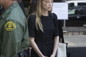 Amber Heard golpeada