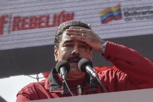 Maduro speaking (wiping his brow)