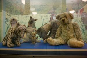 The original Winne the Pooh stuffed toy animals in a glass display case in New York Public Library Grosby.jpg