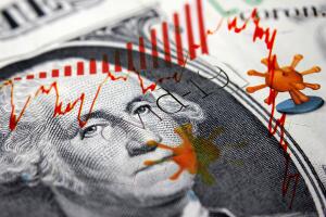 Covid-19 headlines and Dollar banknote