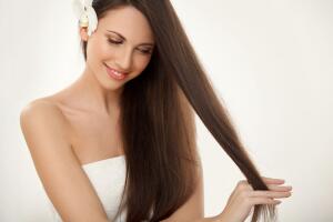 Brown Hair. Beautiful Brunette with Long Hair. Haircare. Spa Bea