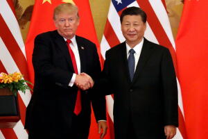 Apretón de manos entre los presidentes Donald Trump y Xi Jiping