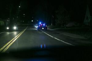 Roadside Car Pulled Over by Police at Night