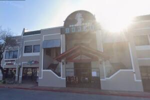 oficial del condado de Caldwell arresto Austin homicidio Club Rodeo policía baleado