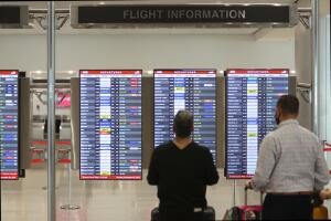 Airlines Cancel Thousands Of Flights As Omicron Cases Surge