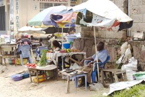 Man Sleeping at Market Stall, Kinshasa
