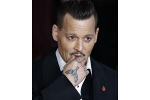 johnny-depp-tatuaje-ave-fotos.jpg