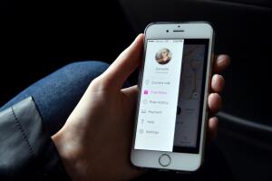 Lyft At Its San Francisco Headquarters Showcasing Lyft Cars, The Glowstache, The Lyft App, Lyft Passengers And Drivers