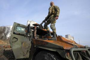 Russia Ukraine soldier on  APC