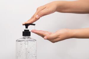 personal hygiene. people washing hand by hand sanitizer alcohol gel for cleaning and disinfection, prevention of spreading of germs during infections of COVID-19 Coronavirus outbreak situation