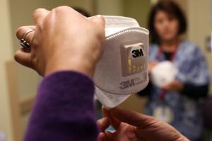 Health Clinic Workers Train Staff For Dealing With Swine Flu Testing